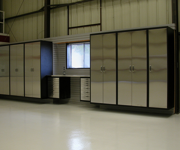 Image of large stainless steel garage cabinets by Beautiful Garage.