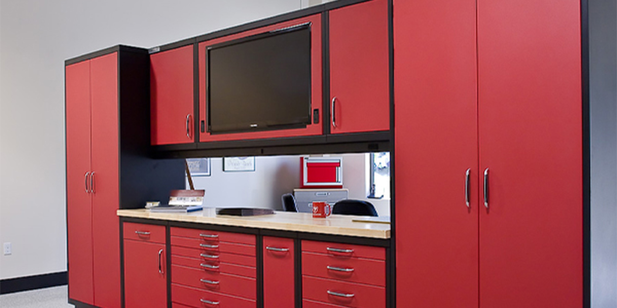 Image of red custom-made garage cabinets.
